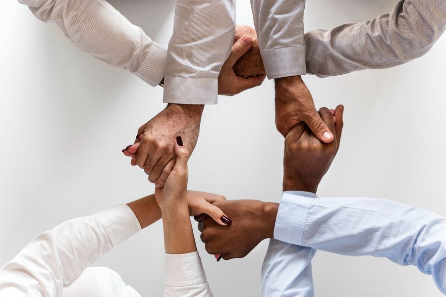 Team joining hands
